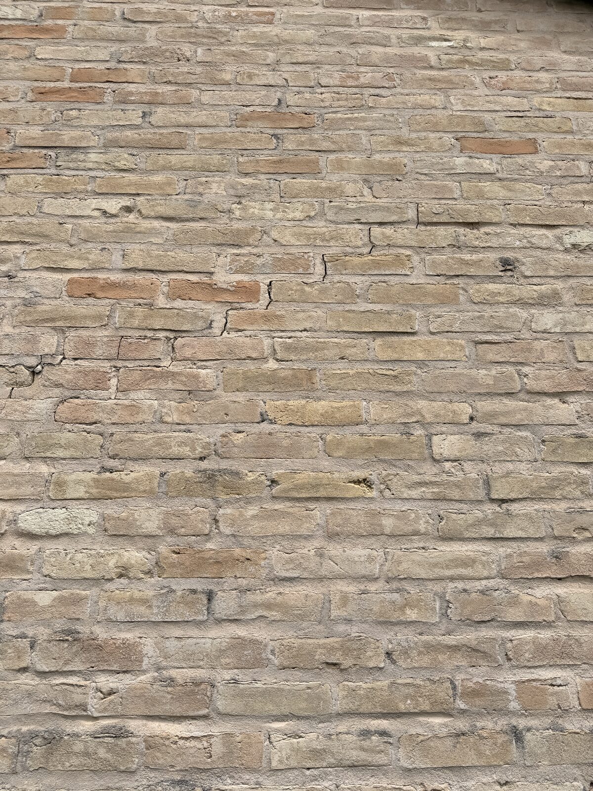 Detail of coursing on an older brick wall