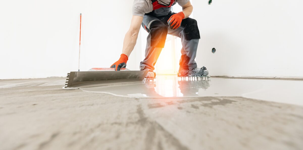 Interior floor leveling in progress at a jobsite