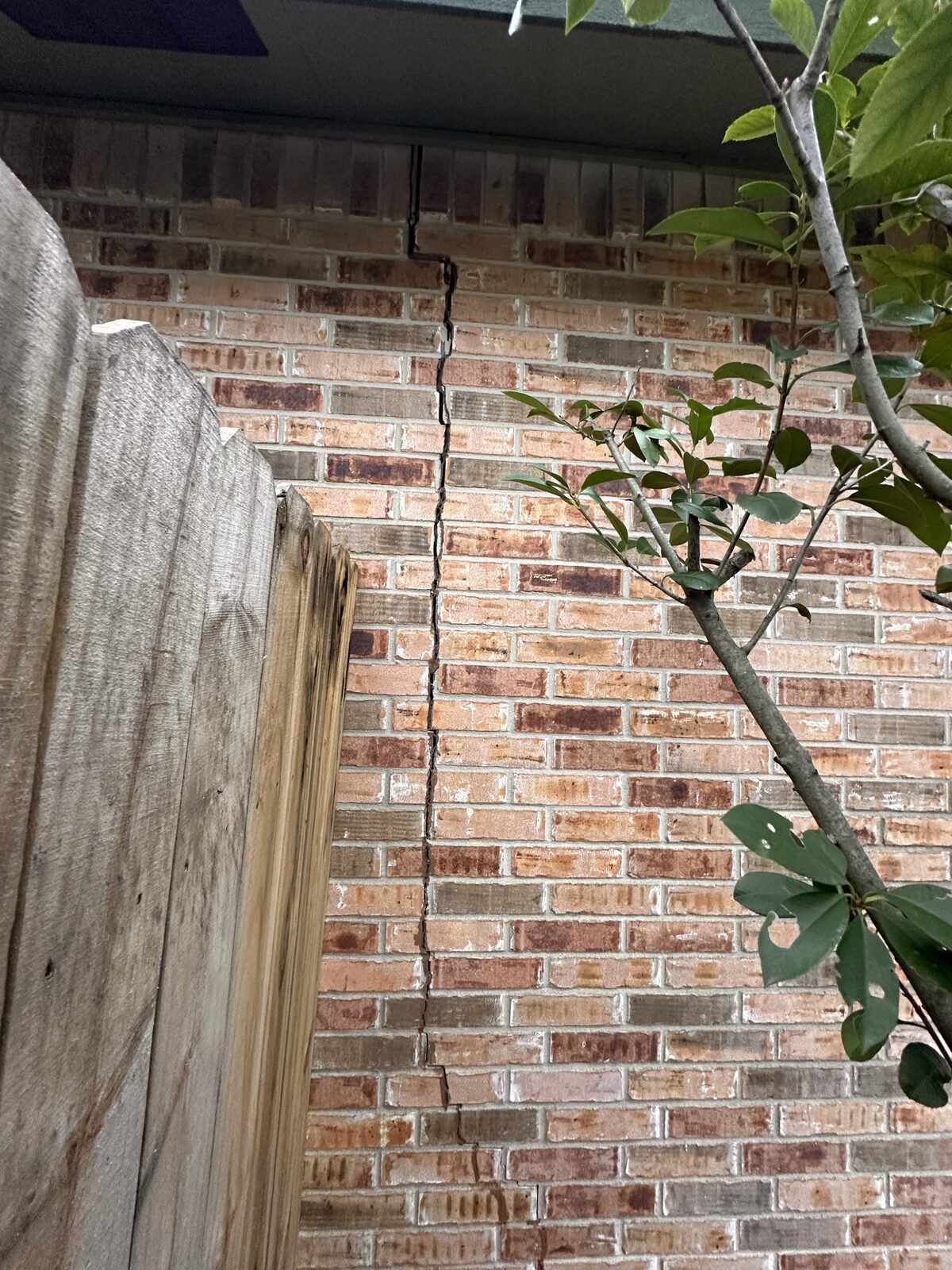 Gap opening along the corner trim of exterior siding, an exterior clue of a shifting foundation